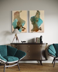 a living room with two chairs and a dresser